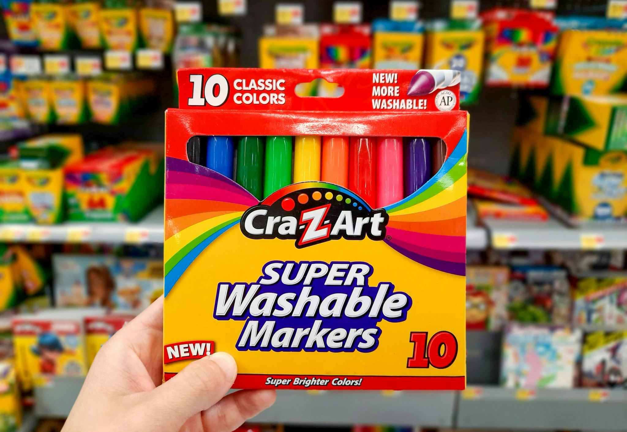 hand holding cra-z-art super washable markers at walmart