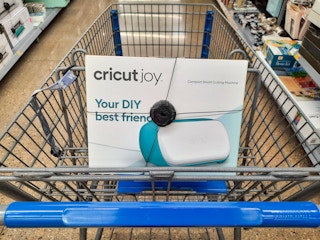 Cricut Joy in the front of a Walmart shopping cart