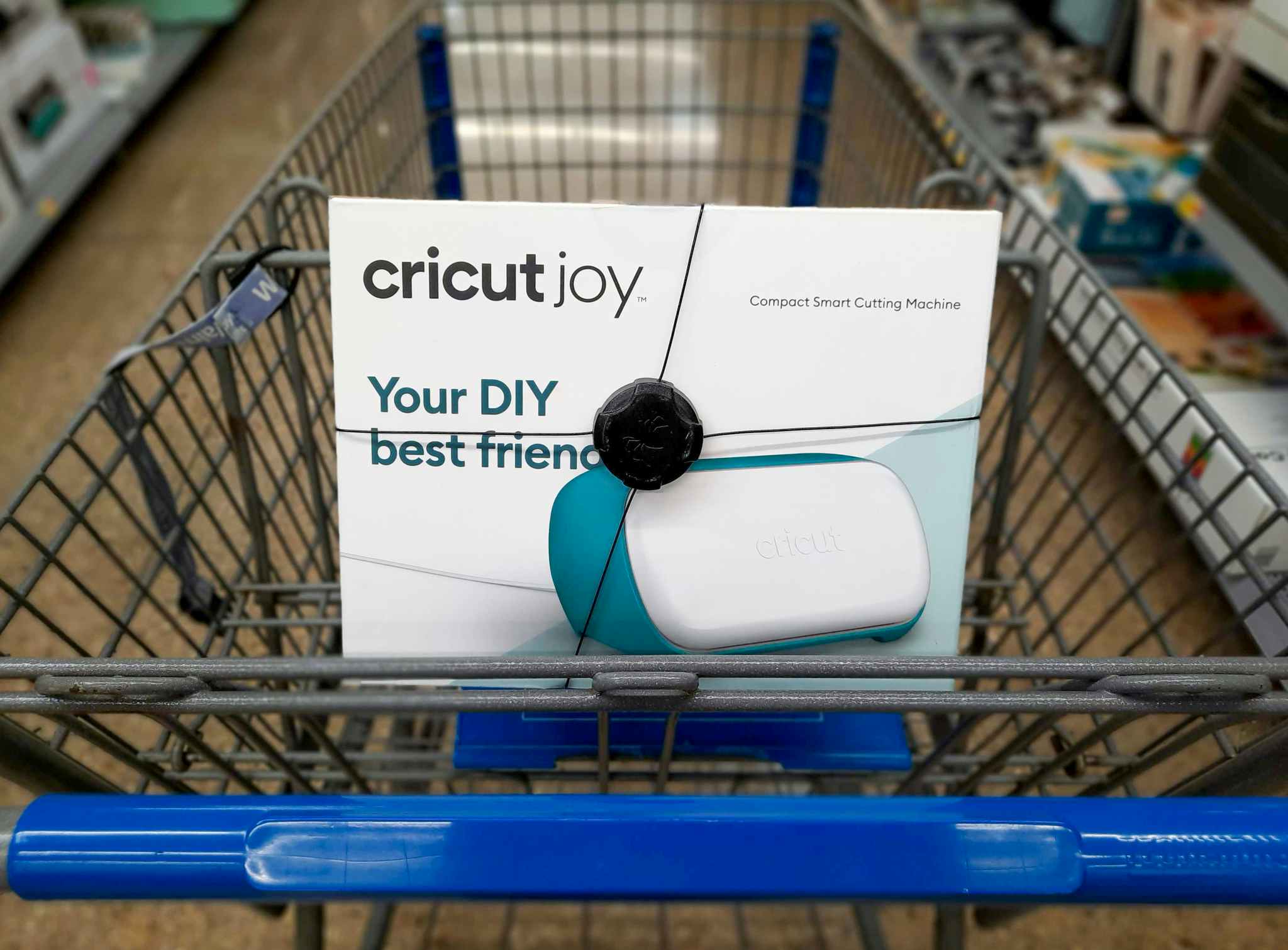 Cricut Joy in the front of a Walmart shopping cart