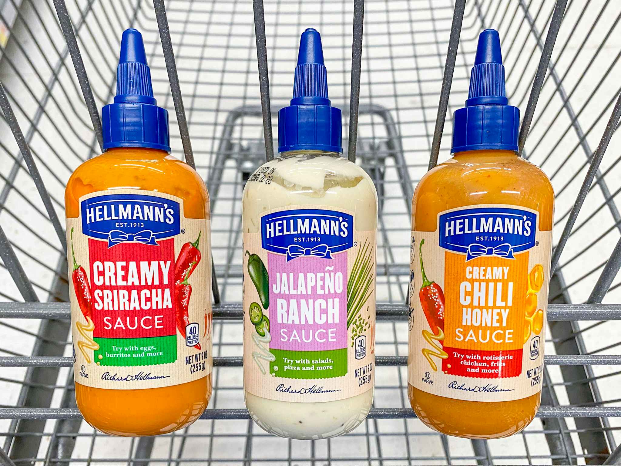 Hellmann's Drizzle Sauce products in Walmart shopping cart