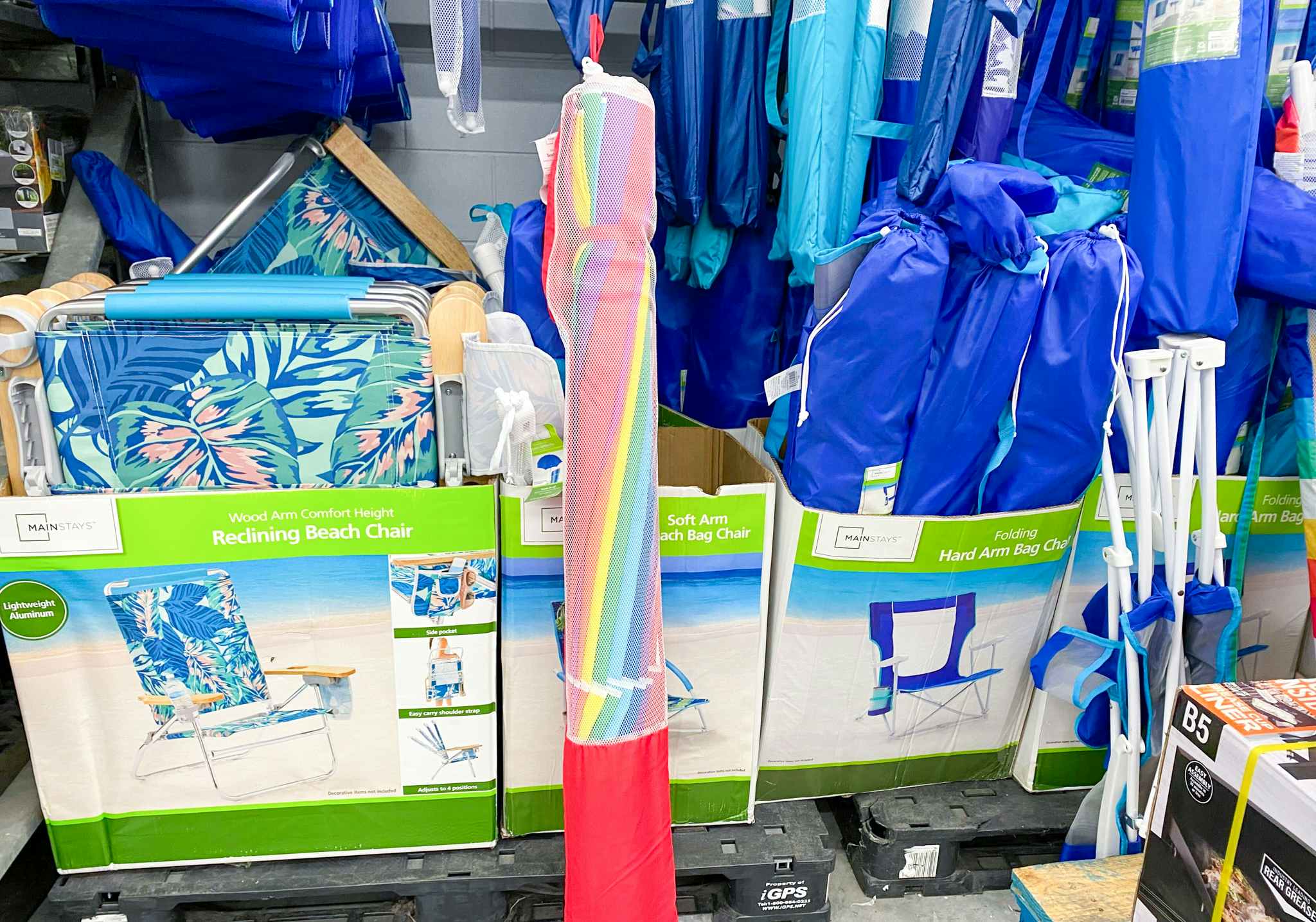 Mainstays 8-Foot Beach Umbrella in aisle at Walmart