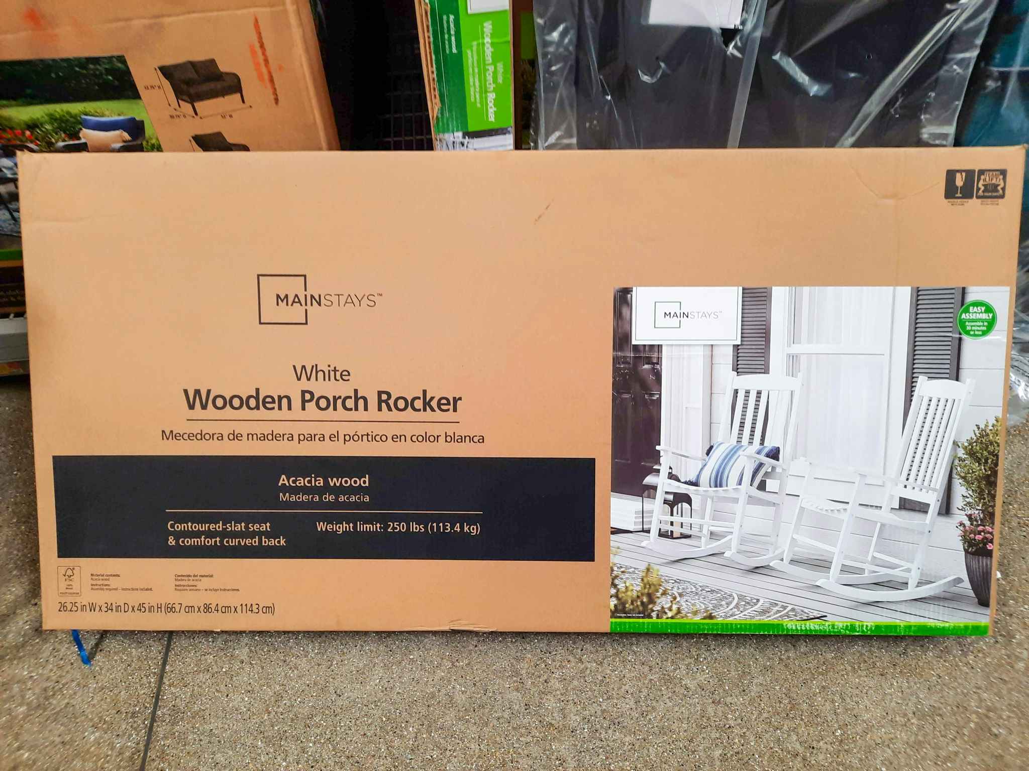 mainstays wooden porch rocker on walmart floor