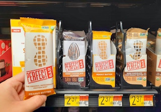 hand holding perfect bar at walmart