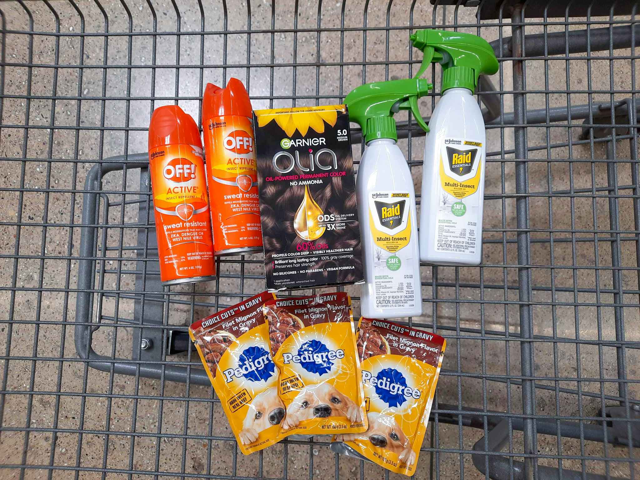 Off, Raid, Garnier Olia, and Pedigree products in Walmart shopping cart