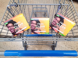 Playtex Clean Comfort tampon products in Walmart shopping cart