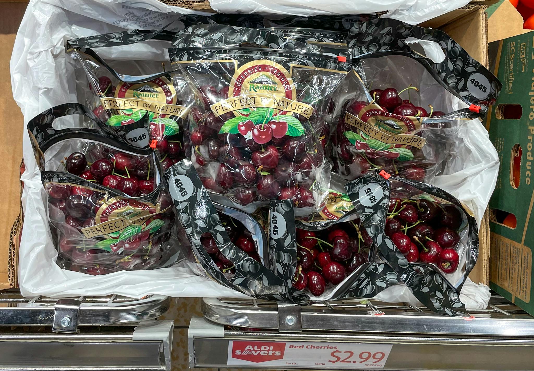 cherries in bags with sales sign at aldi