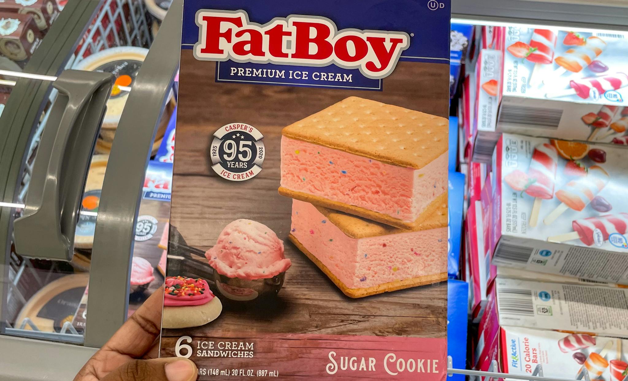 fatboy sugar cookie ice cream sandwiches in a box hand held at aldi