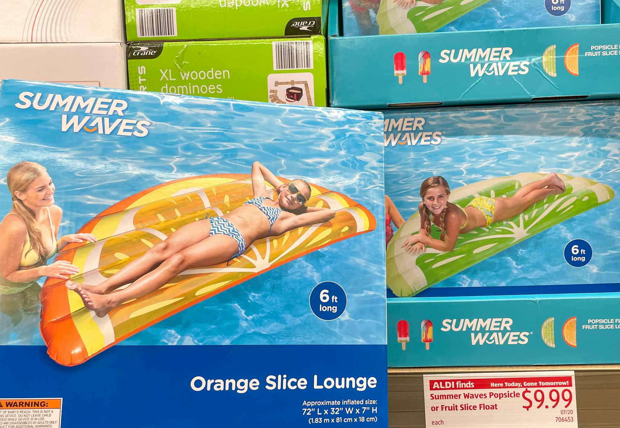 fruit slice pool floats on a shelf at aldi with price tag