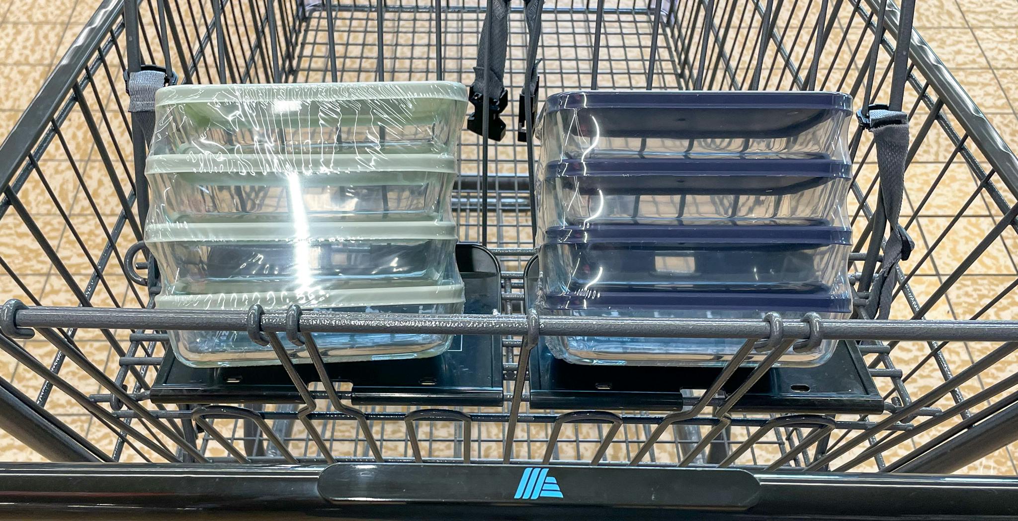 glass containers in a cart at aldi