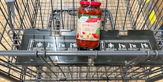 organic marinara sauce in a cart at aldi
