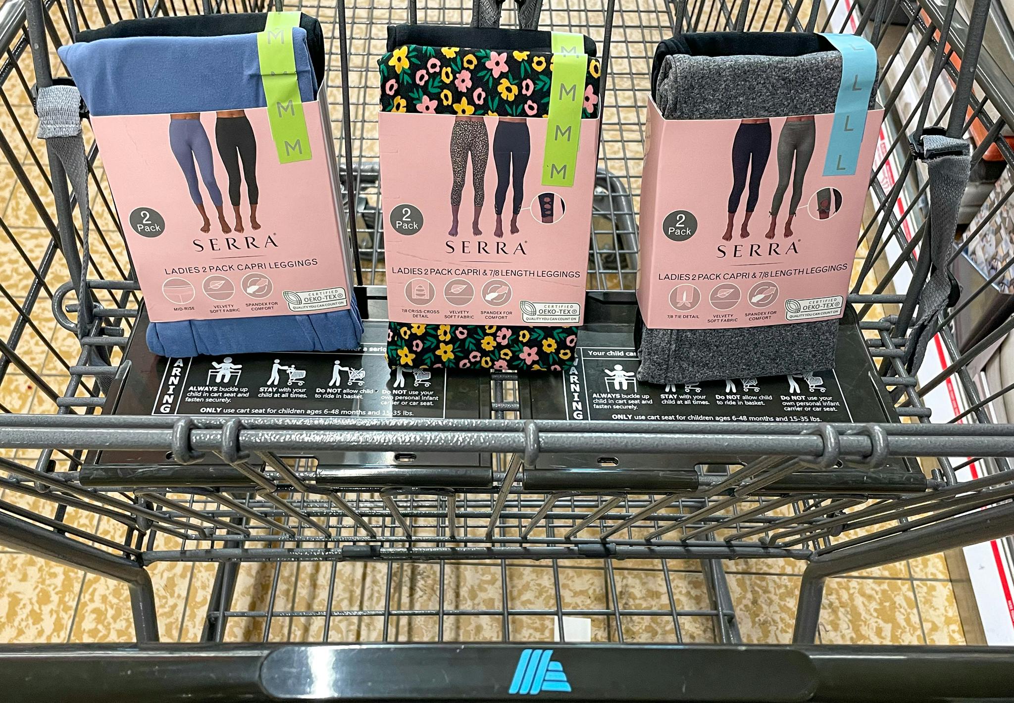 variety of women's leggings in a cart at aldi