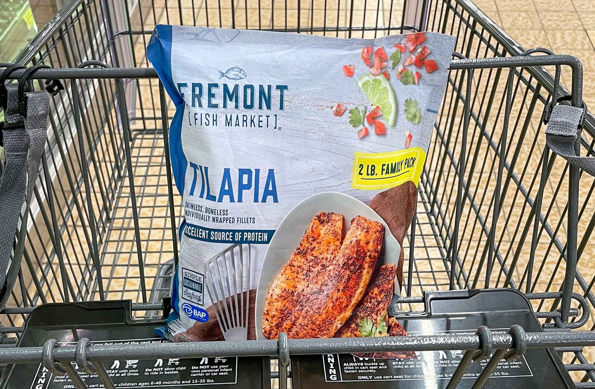 frozen tilapia in a bag on a cart at aldi