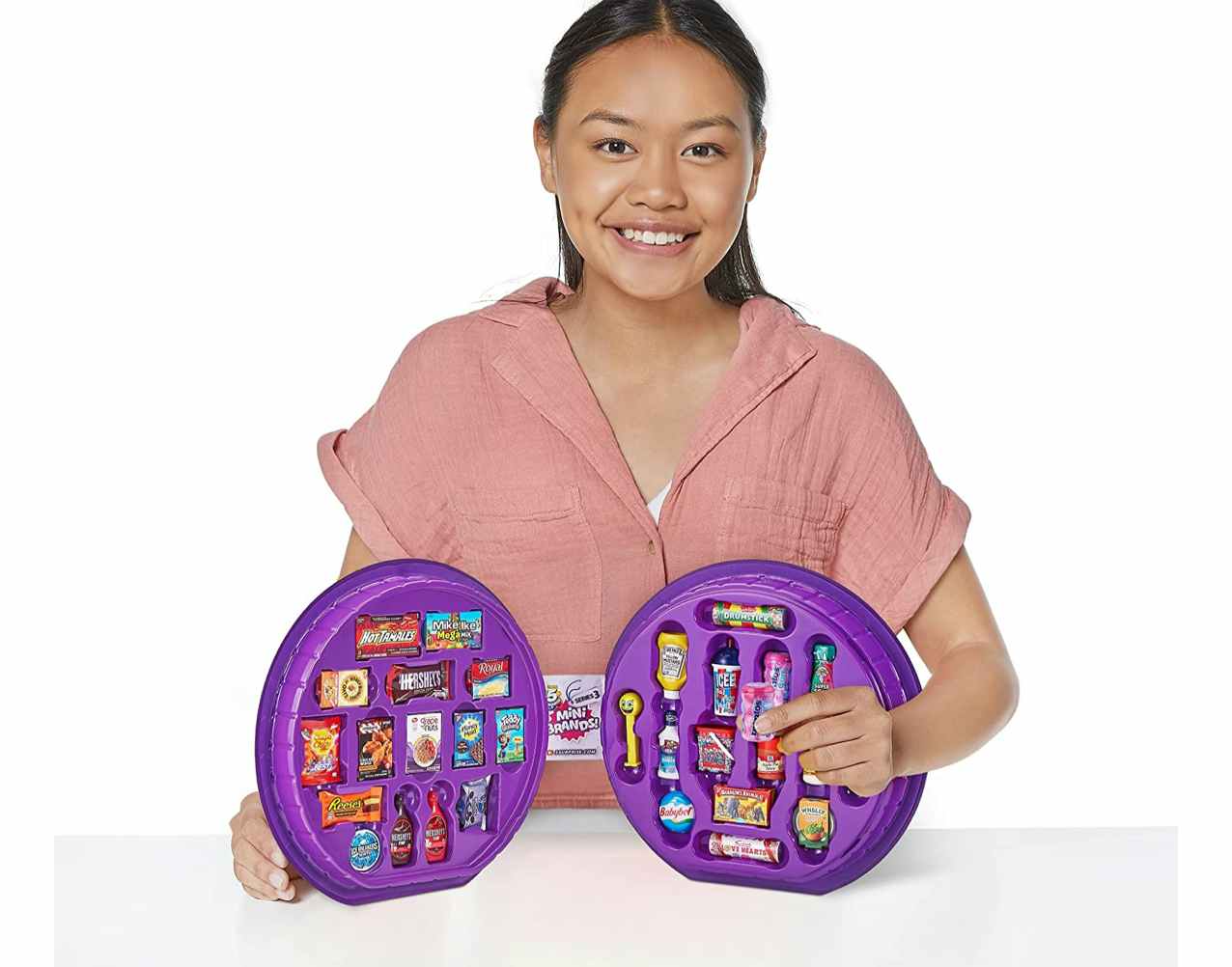 A person opening the 5 brands case