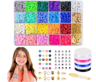 Colorful bead making kit on a white background