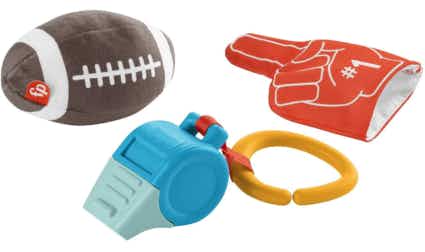 Three football-themed baby toys on a white background