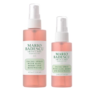 Two bottles of facial spray on a wjite background