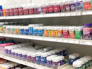 a variet of olly vitamins on shelfs at target