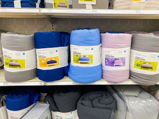 room essentials microfiber comforters on a target shelf