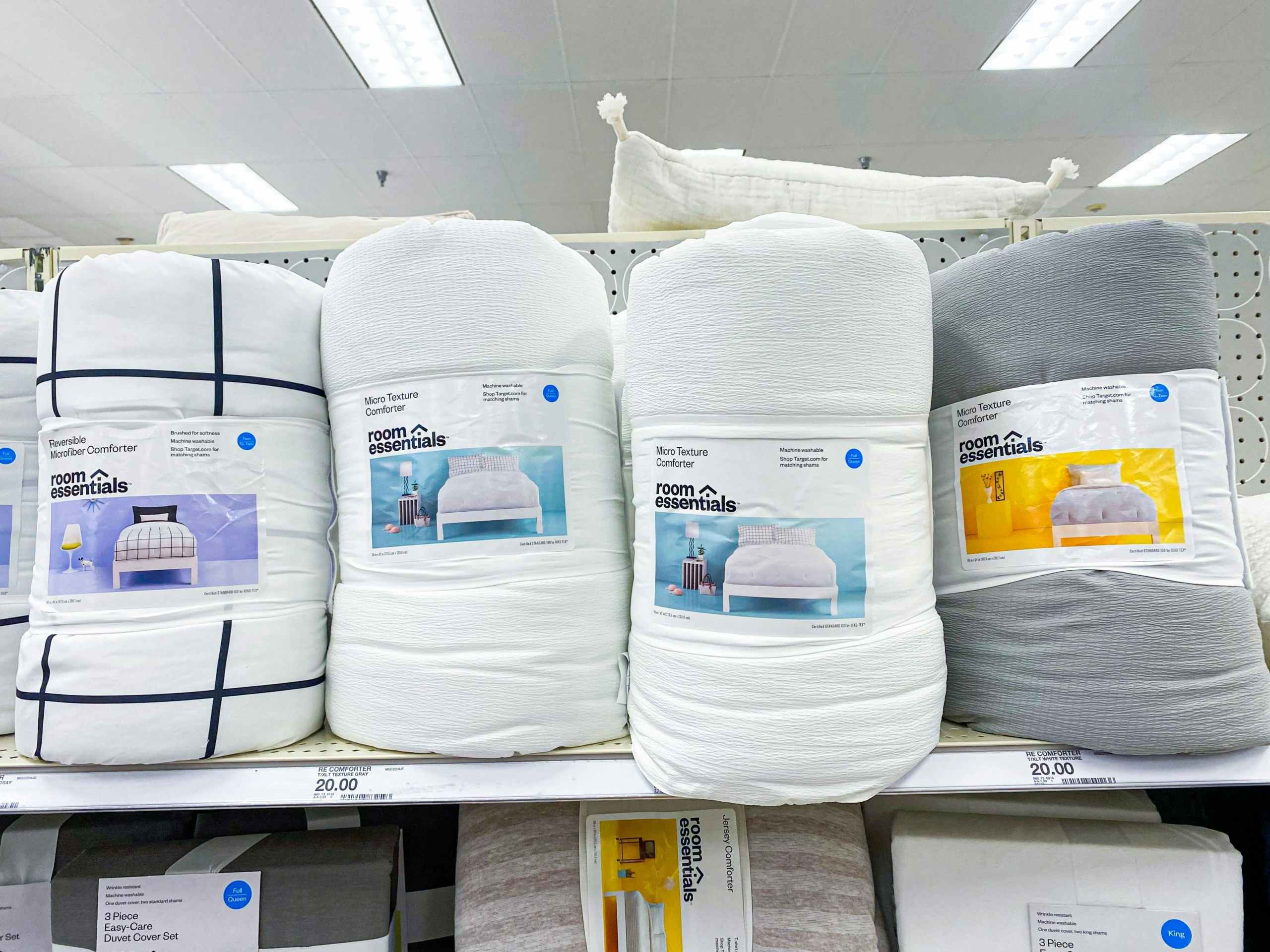 room essentials microfiber comforters on a target shelf