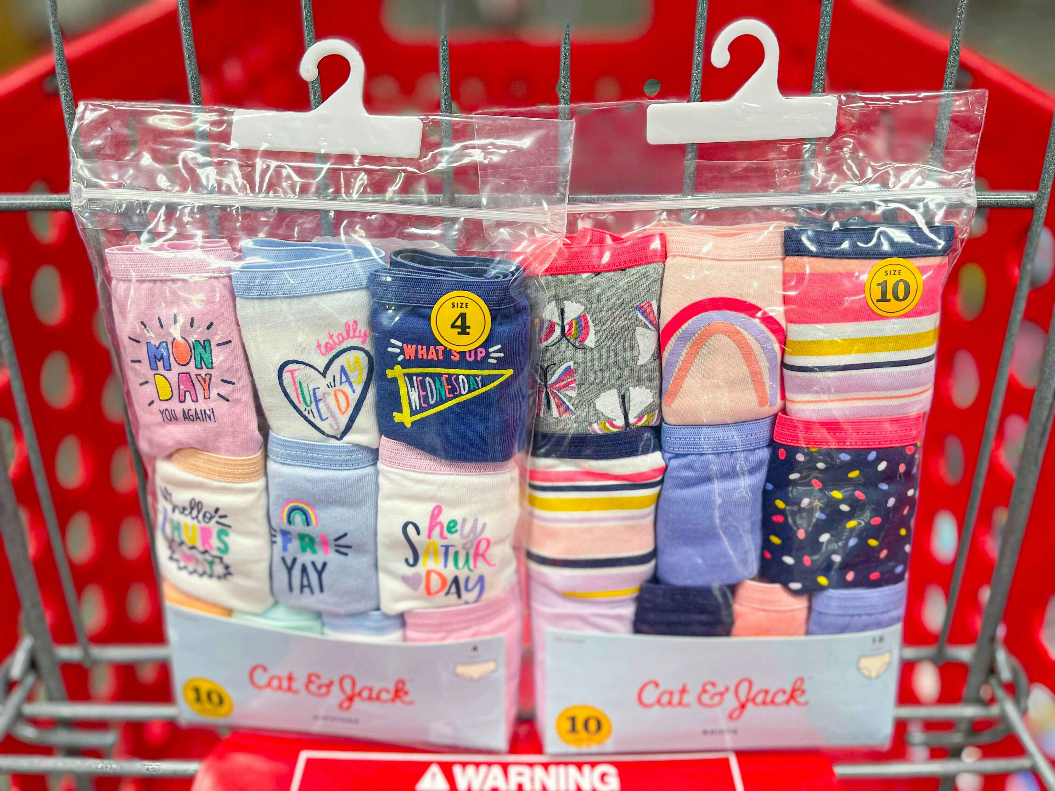 two packs of girls' underwear in Target shopping cart