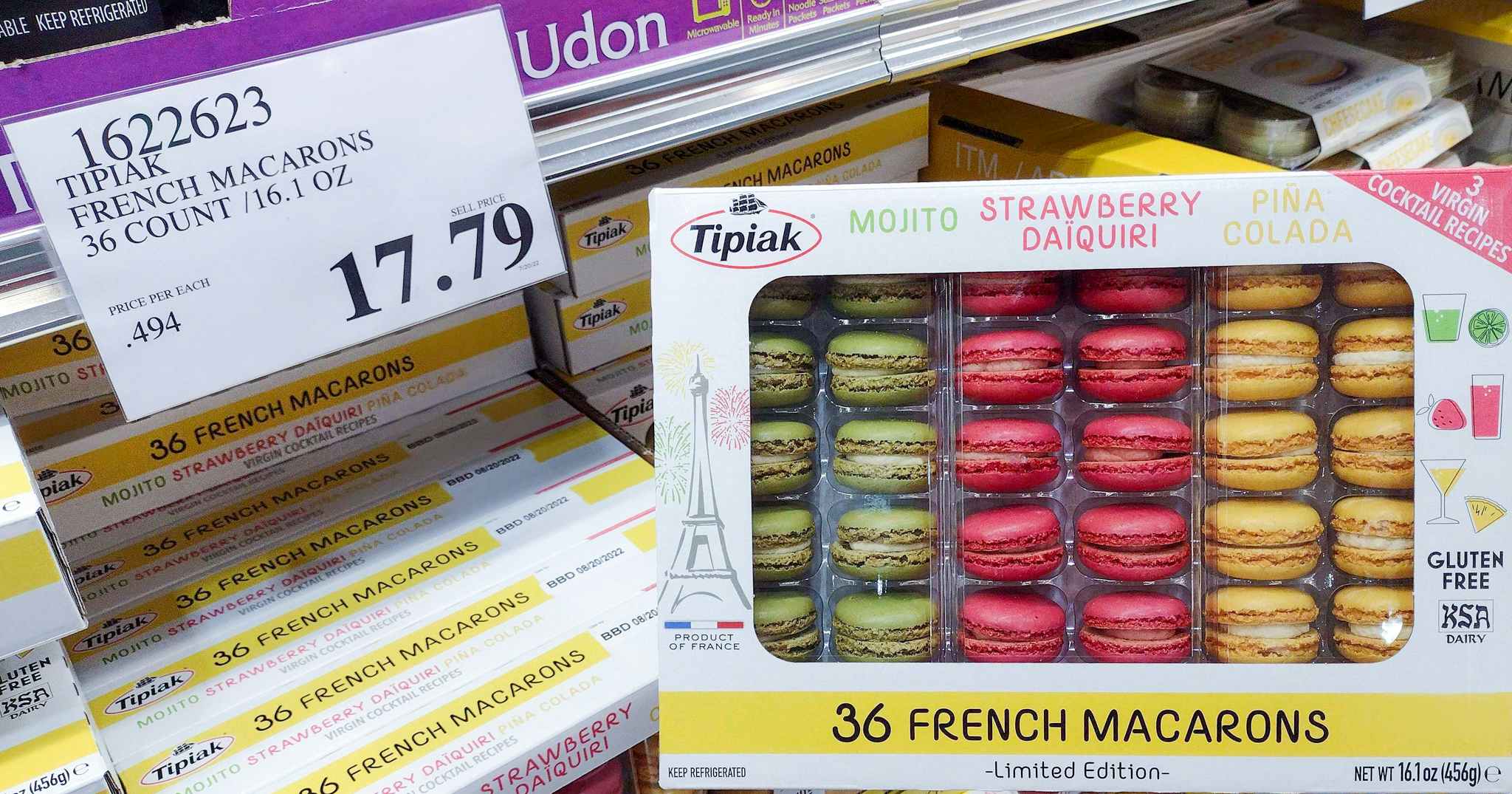 cocktail flavored macarons in package on a shelf with sales tag at costco 