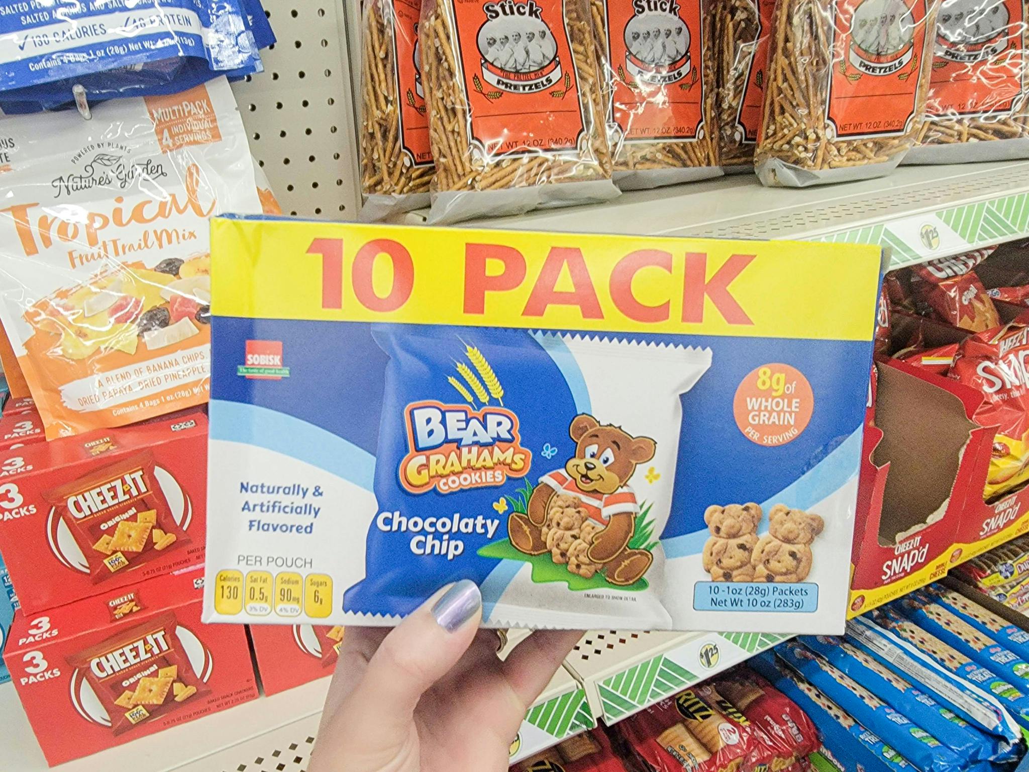 hand holding a 10 pack of bear grahams cookies