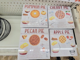 pumpkin, cherry, pecan, and apple pie signs