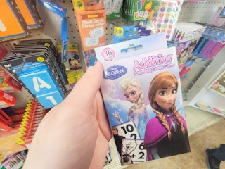 hand holding disney frozen addition flash cards