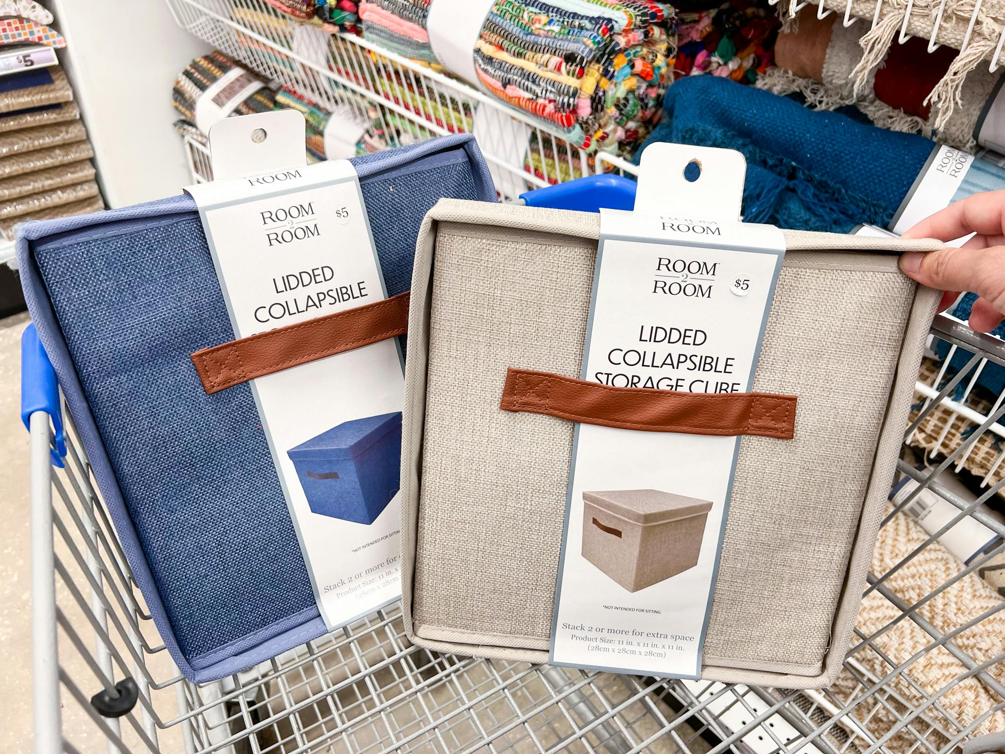 Room to Room Collapsible Storage cubes in a shopping cart at Five Below
