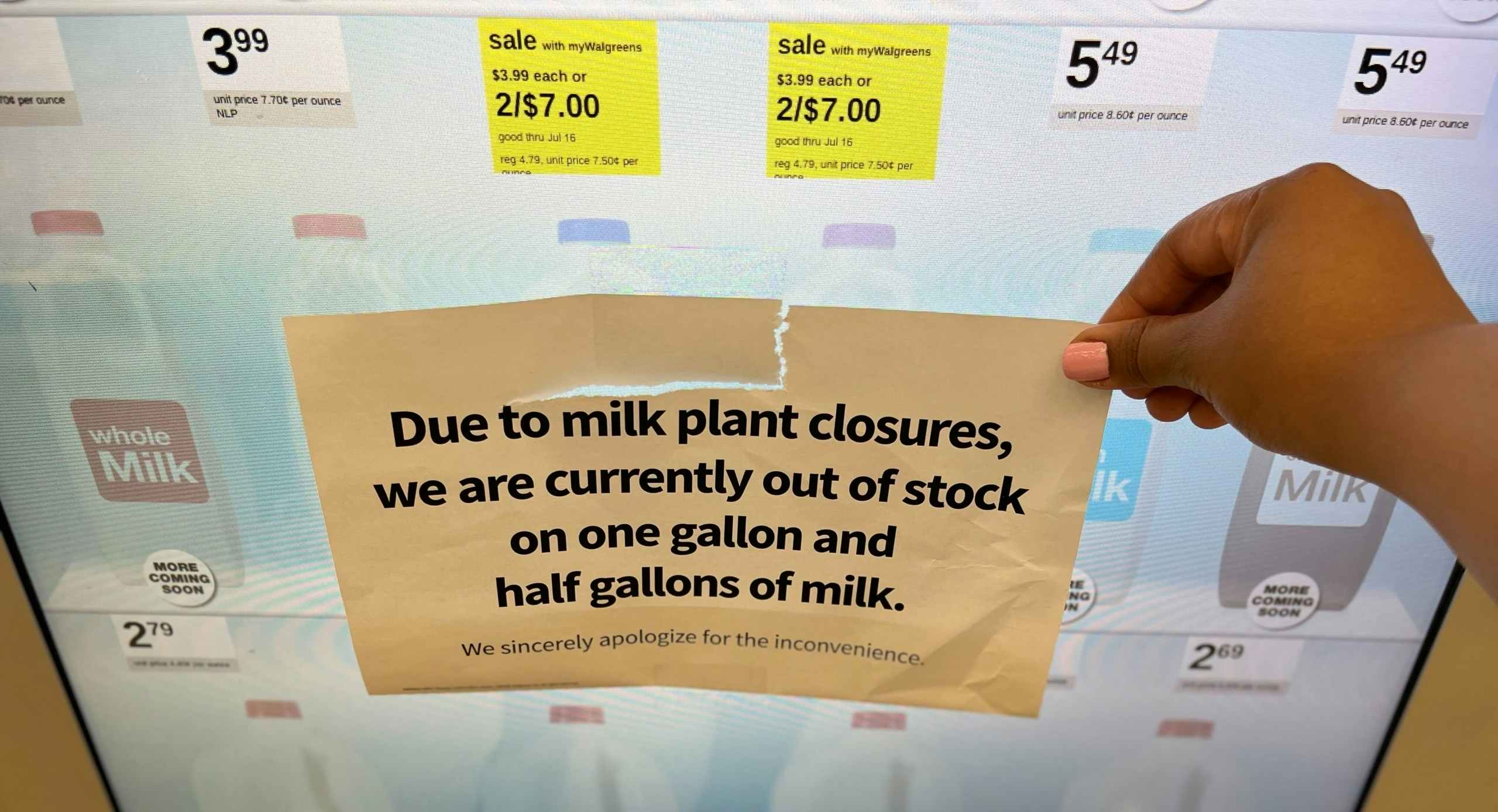 Milk shortage sign on the dairy case door at a Walgreens in Chicago.