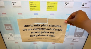Milk shortage sign on the dairy case door at a Walgreens in Chicago.