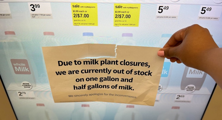 Milk shortage sign on the dairy case door at a Walgreens in Chicago.