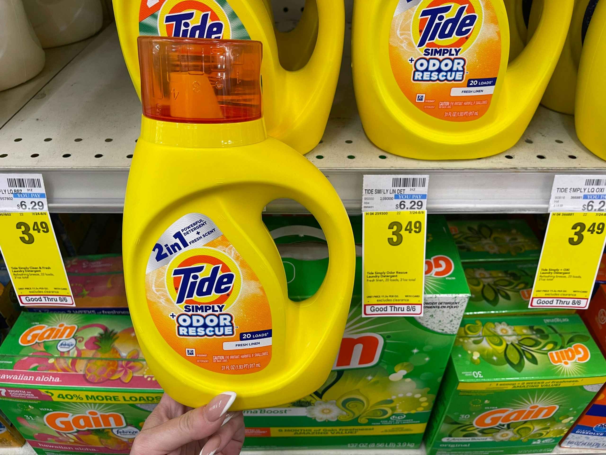 tide simply laundry detergent next to sales tag