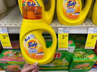 tide simply laundry detergent next to sales tag