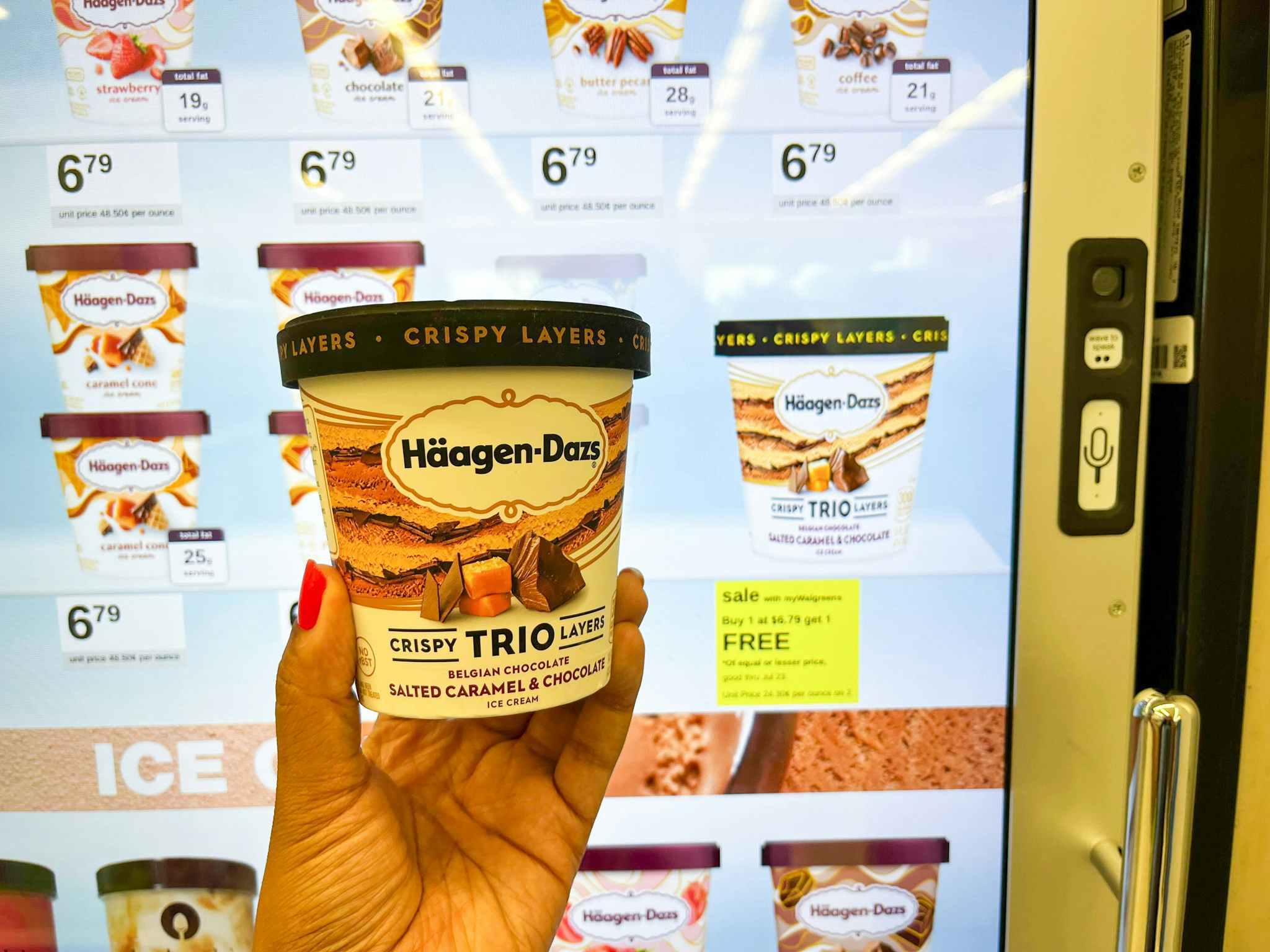 hand holding pint of haagan daz ice cream