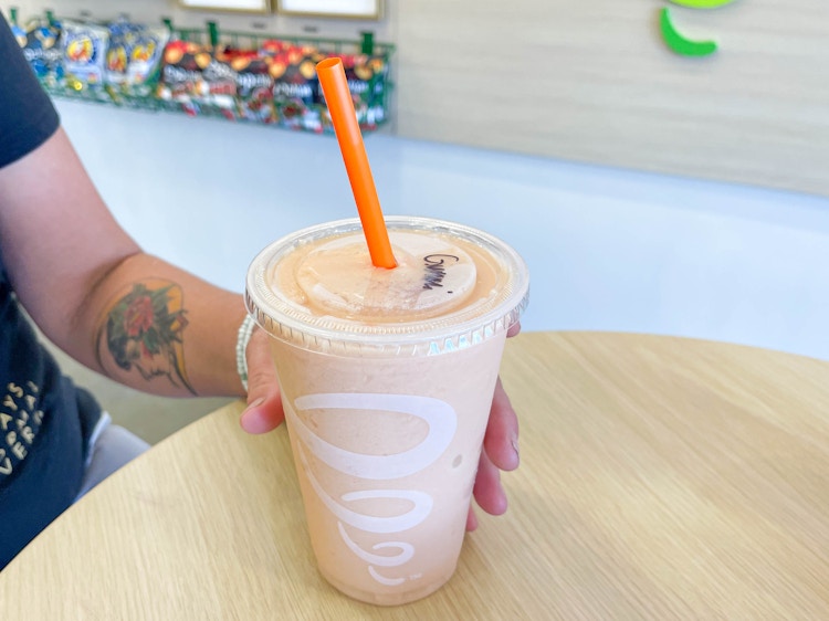 smoothie being held on table 