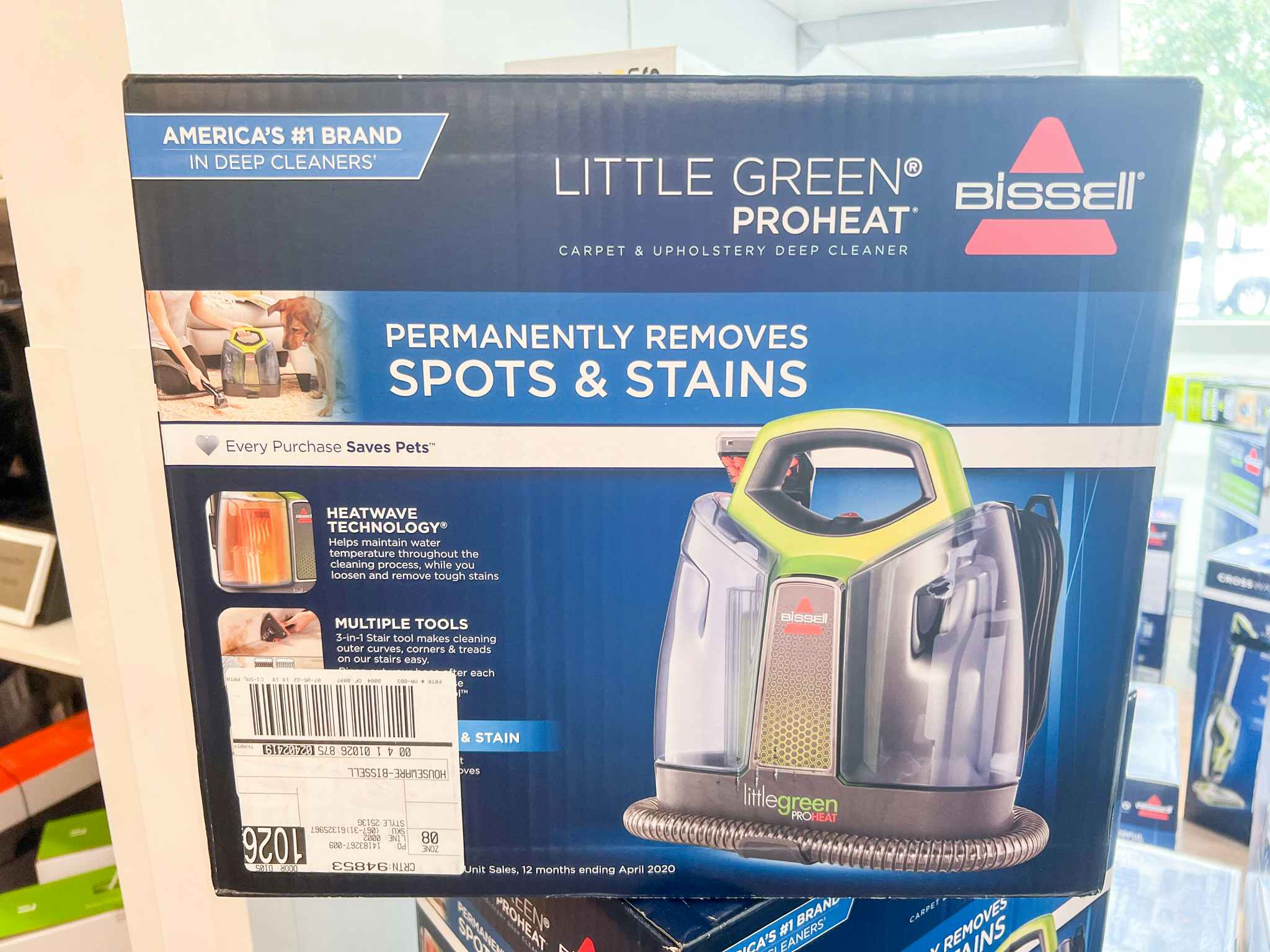 A Bissell Little Green Proheat on display on a shelf at Kohls