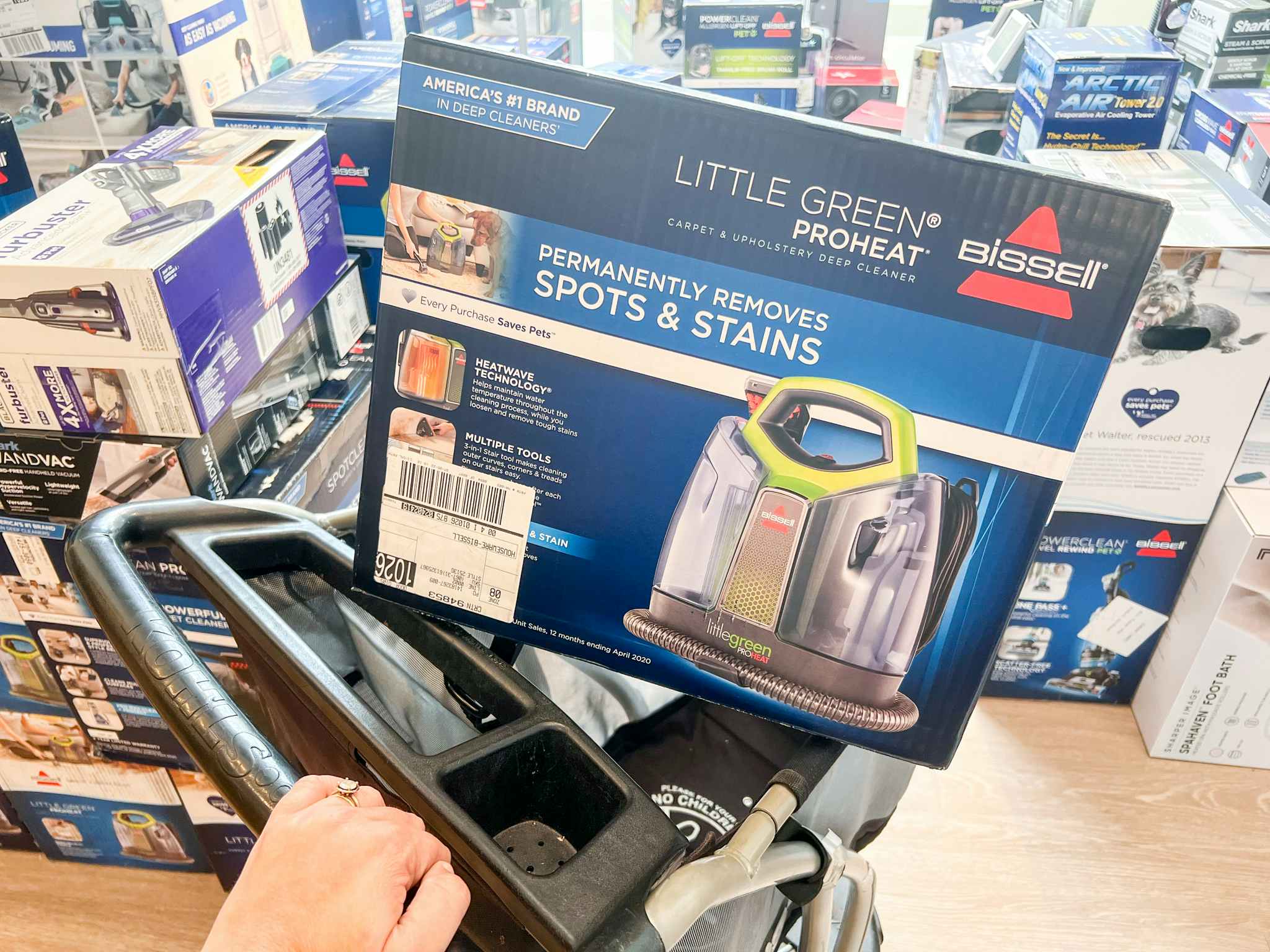A Bissell Little Green Proheat in a Kohls shopping cart