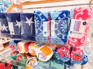 A shelf of The Big One beach towels at Kohls