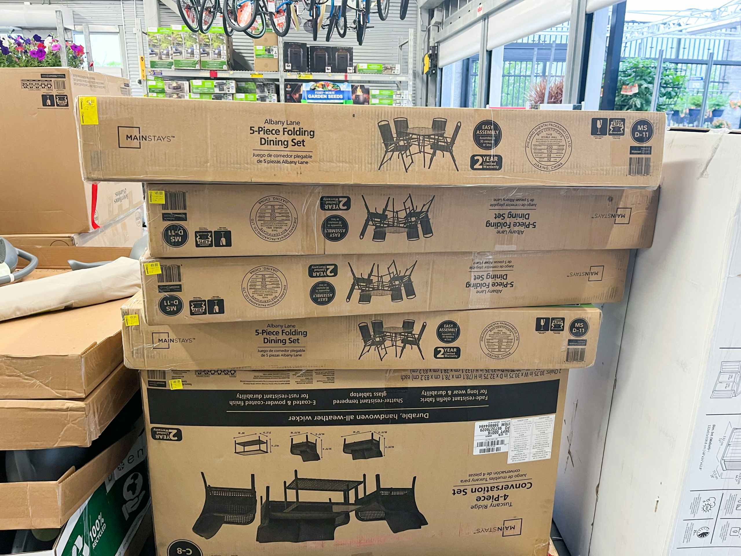 boxes of Walmart patio furniture on clearance
