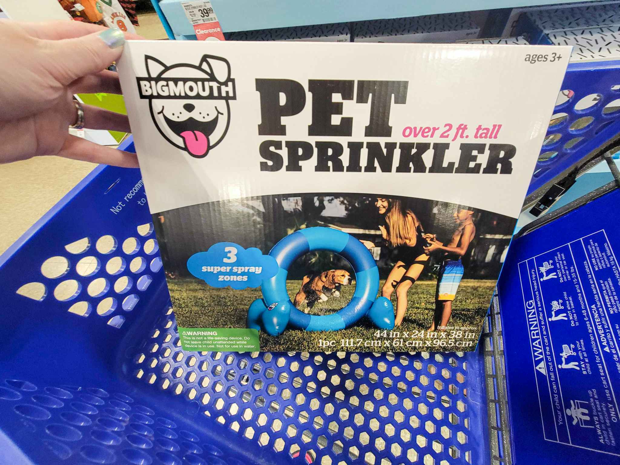 a 2 foot tall pet sprinkler in a cart