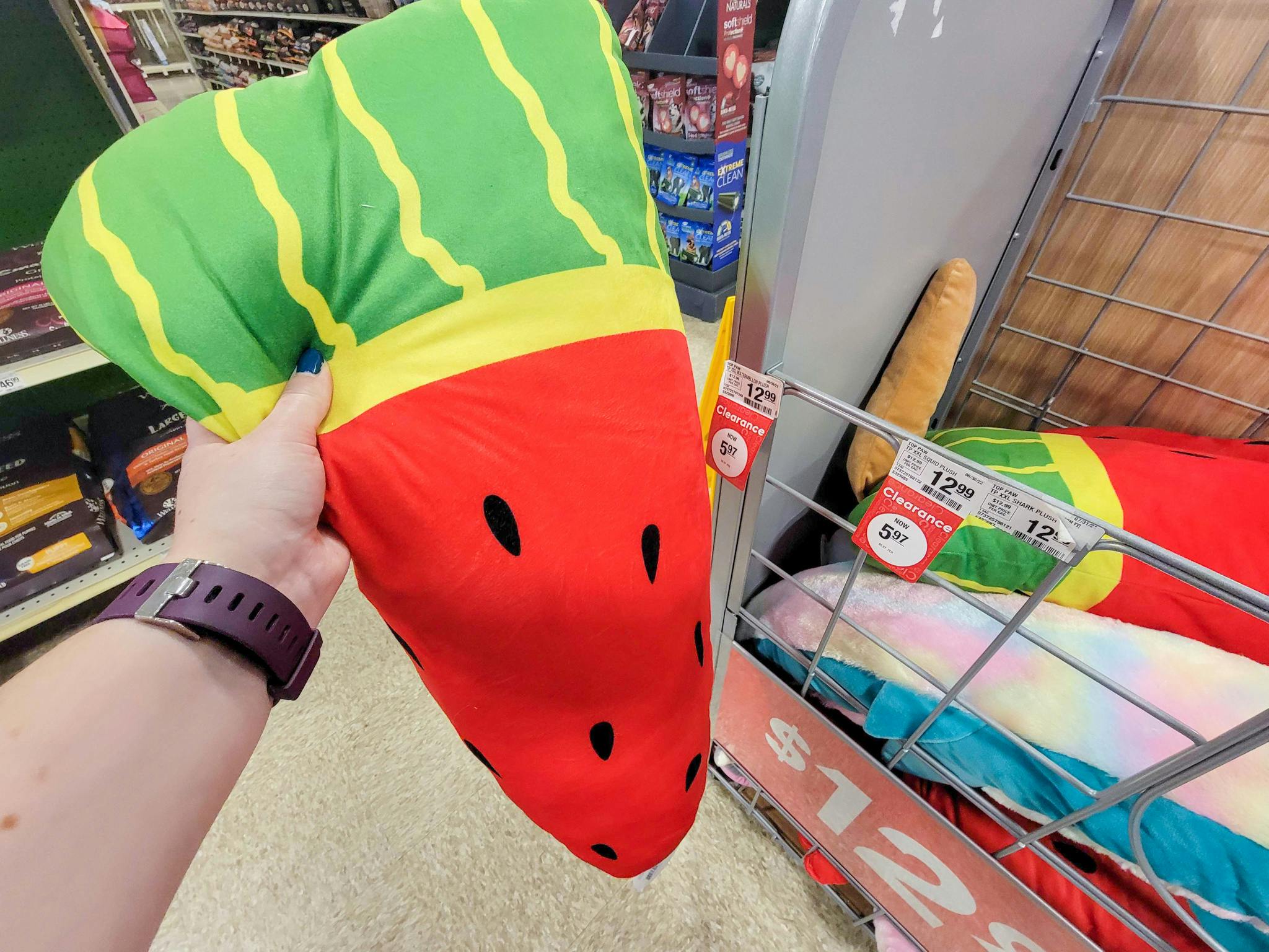 hand holding an xxl watermelon dog toy