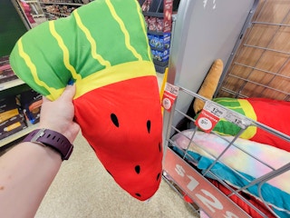 hand holding an xxl watermelon dog toy