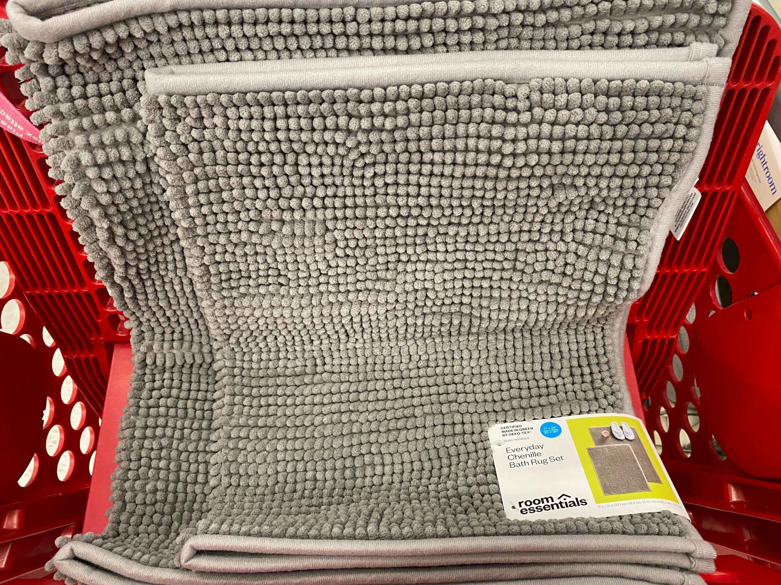 2-pack of everyday chenille bath rugs in a target cart