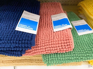3 everyday chenille bath rugs on a target shelf