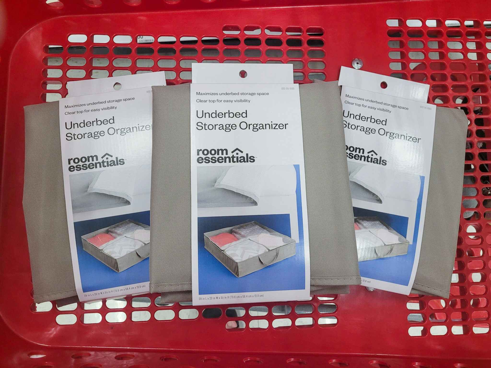 3 room essentials underbed storage organizers in a target cart