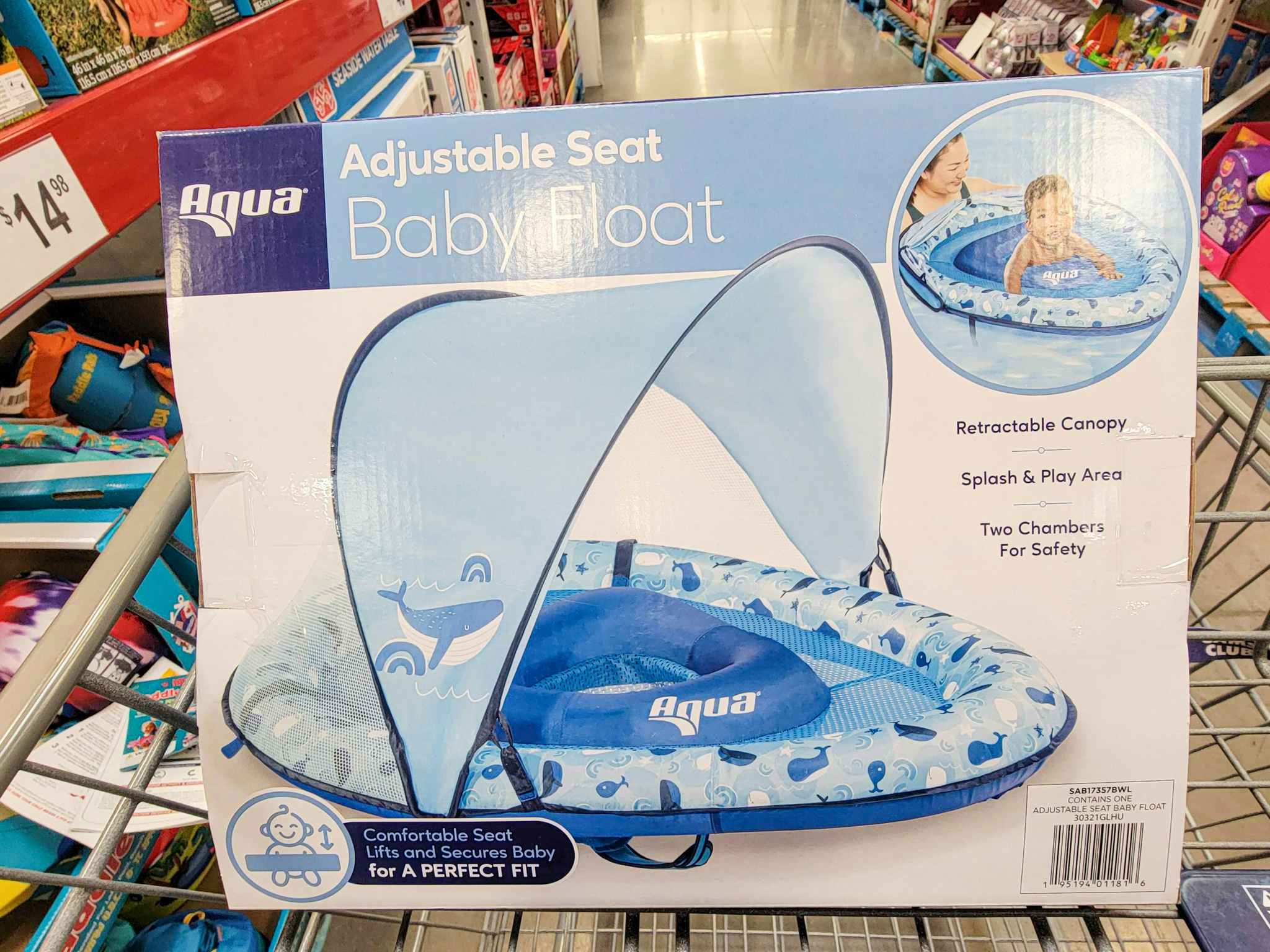 a blue adjustable seat baby float in a cart