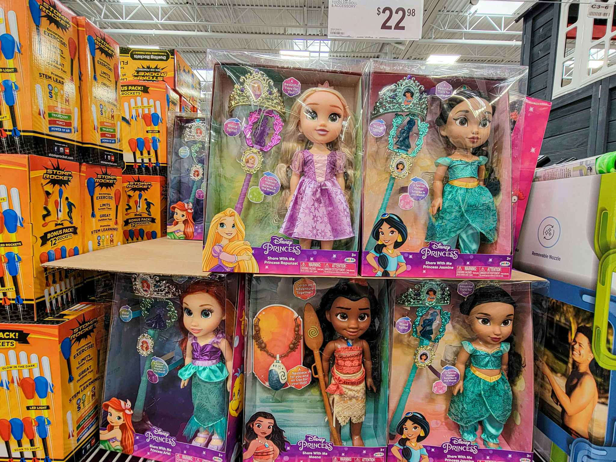 a variety of disney princess dolls, rapunzel, moana, ariel, jasmine