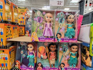 a variety of disney princess dolls, rapunzel, moana, ariel, jasmine