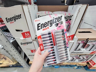 hand holding a 48 pack of energizer aa batteries